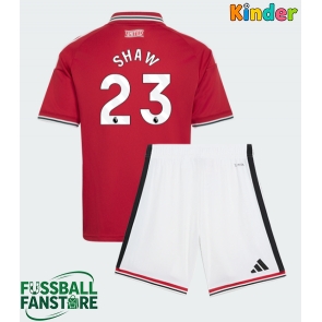 Manchester United Luke Shaw #23 Replik Heimtrikot Kinder 2026-27 Kurzarm (+ Kurze Hosen)